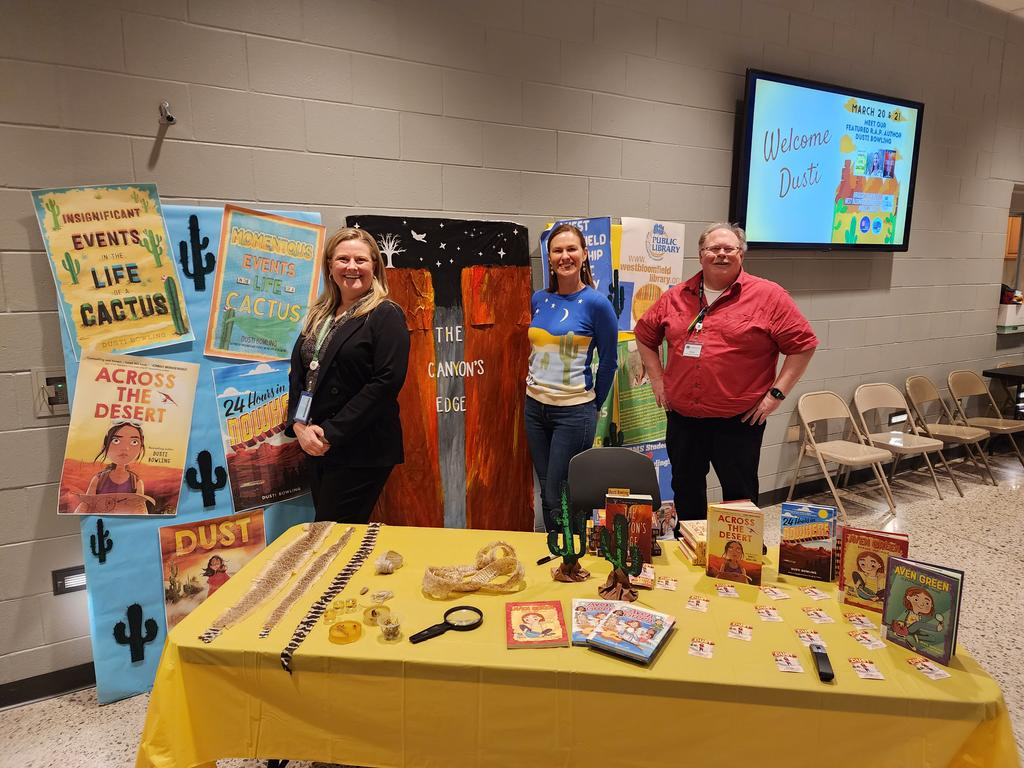 Young Adult Librarian Steve Ketcham with author Dusti Bowling and WBMS media specialist Cindy Carson at a school presentation