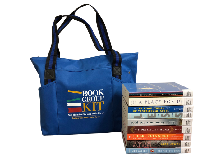 A Book Group Kit bag with a pile of book club titles