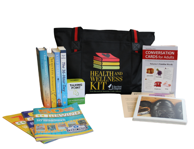 A Health and Wellness Kit with memory care books, photo books, and conversation cards
