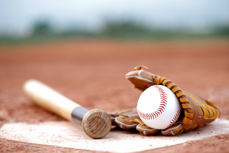 baseball and mitt on catcher's mound
