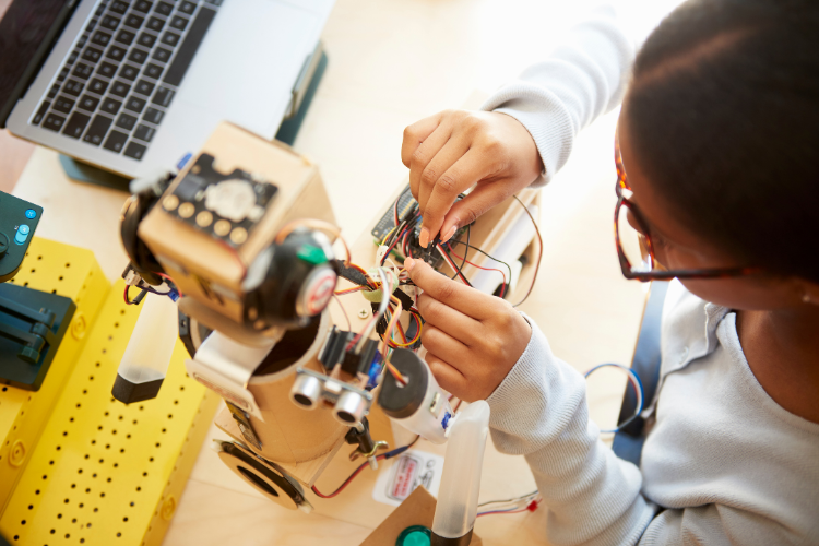 child building a robot