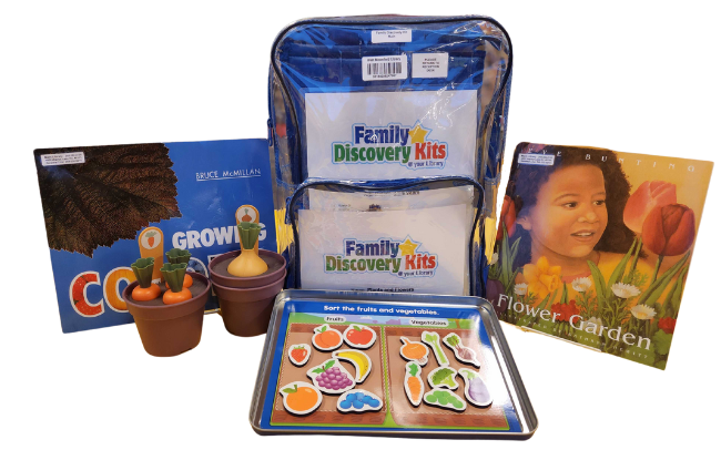 Family Discovery Kit with books on flowers and garden-related counting toys and magnetic activity board