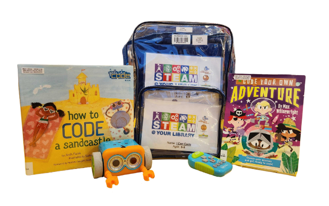 STEAM kit with children's robot toy and books on coding