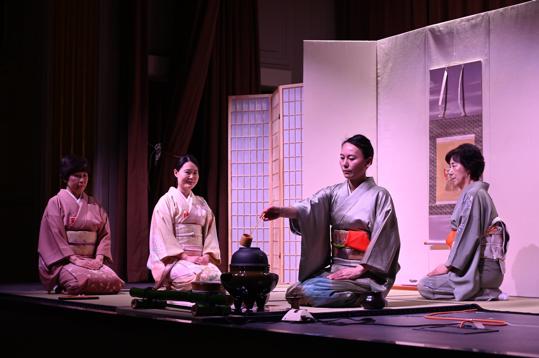 people participating in a tea ceremony