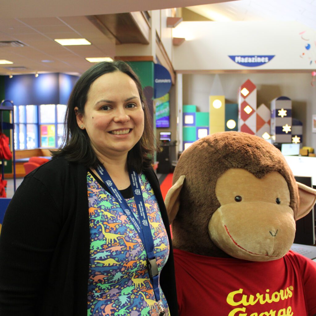 Librarian Justine at the Main Library Youth Information Desk