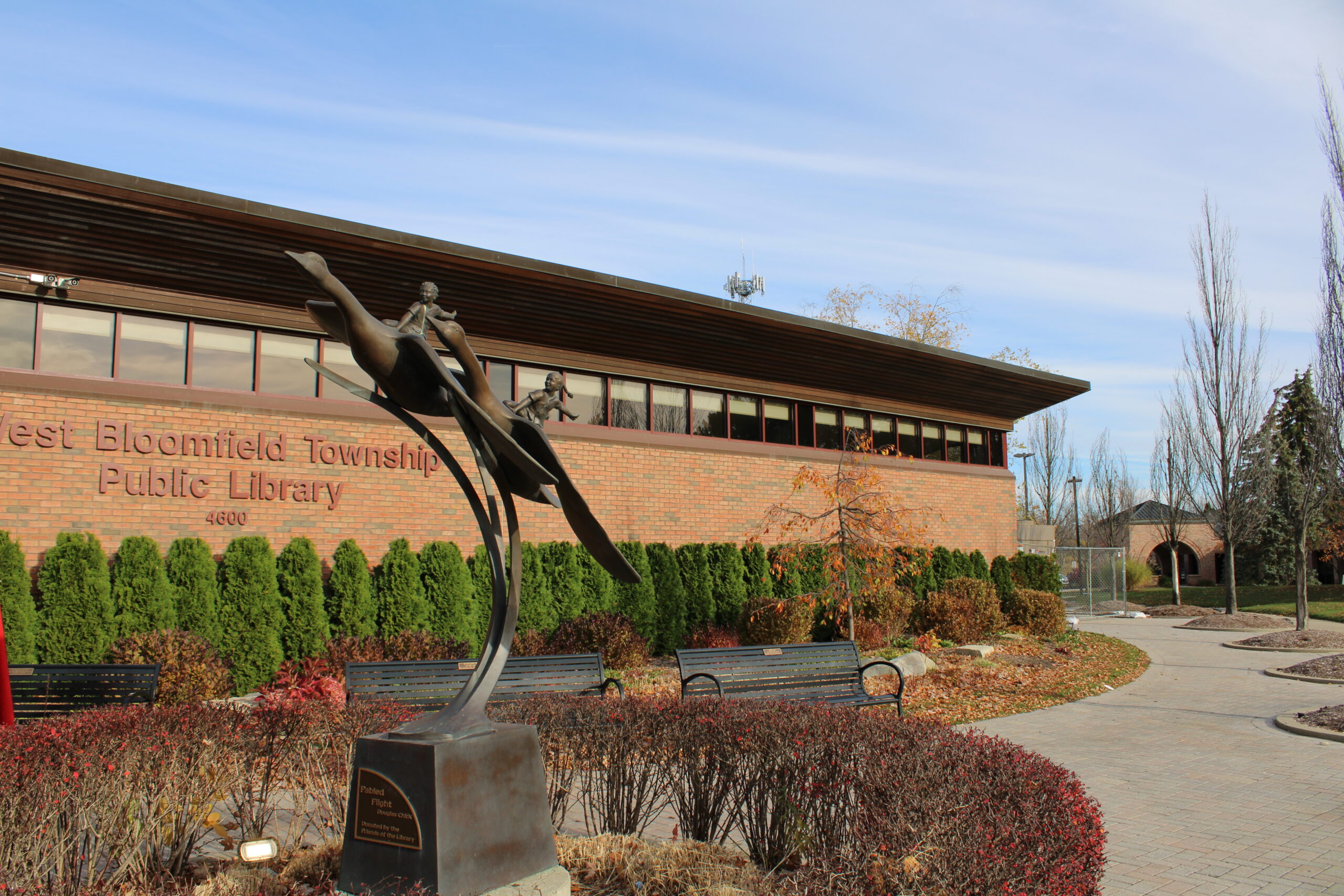 Main Library statue in fall